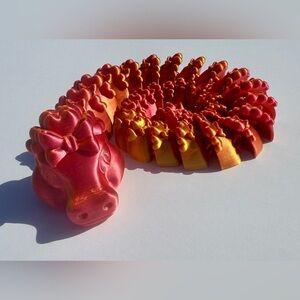 3D-printed "Flexi Diamond Dragon with heart